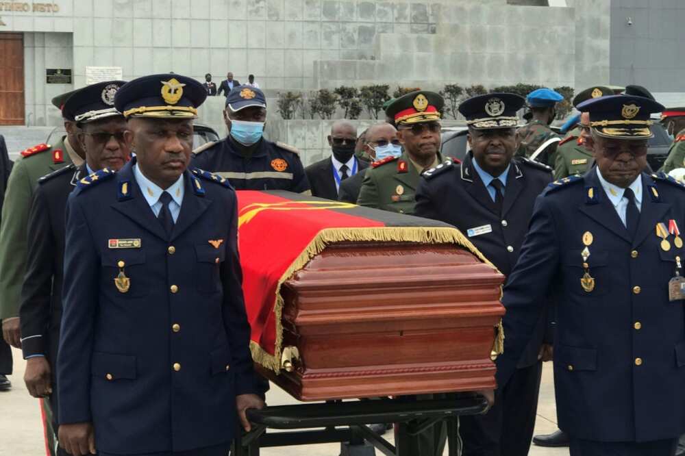 The cortege carrying the remains of former Angolan President Jose Eduardo Dos Santos arrives at the Praca da Republica in Luanda on August 27, 2022, where he will lie in state ahead of his funeral