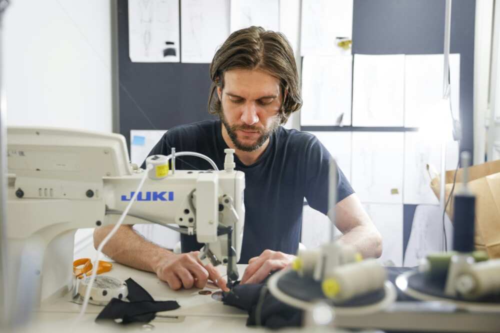 Burc Akyol at work in his home / workshop