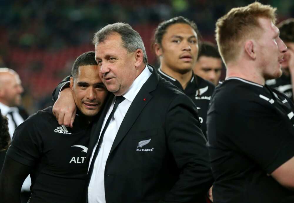 New Zealand coach Ian Foster embraces scrum-half Aaron Smith as they celebrate their victory