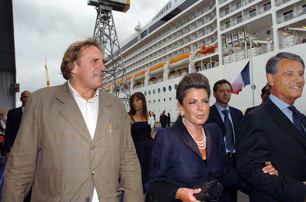 Actor Gerard Depardieu(L), and businesspersons Rafaela Aponte (C) and Gianluigi Aponte (R)