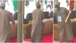 Lecturer wearing flowing agbada & cap takes the dance floor during convocation, crowd shout in funny video
