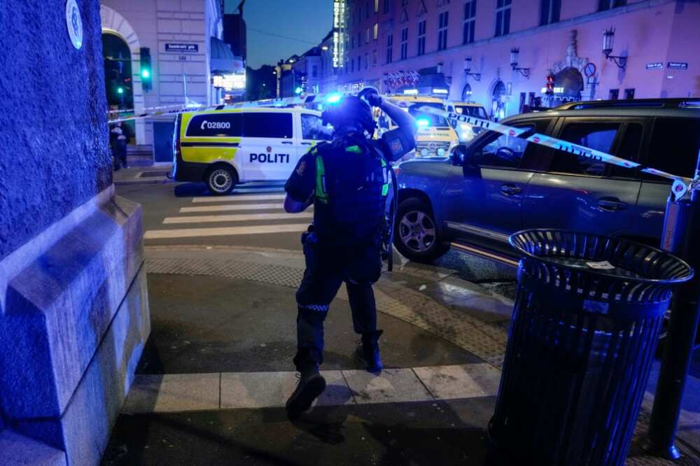 Police secure the area following a shooting in central Oslo that killed two people Police secure the area following a shooting in central Oslo that killed two people
