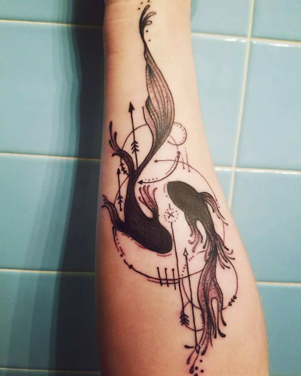 Pisces signs tattoo