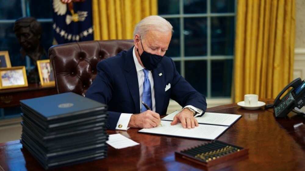 Biden signs 17 executive orders to reverse Trump policies