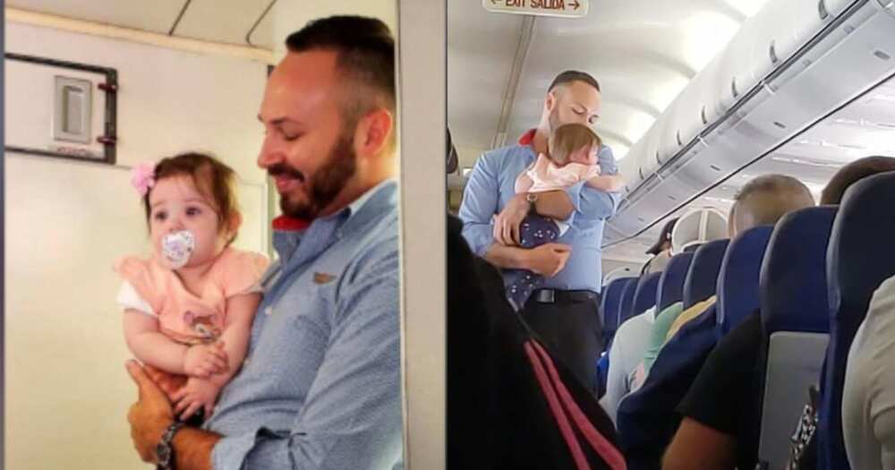 Male flight attendant warms hearts after calming down a crying baby