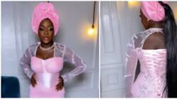 Asoebi fashion: Video of ebony beauty in pink dress goes viral, style lovers impressed