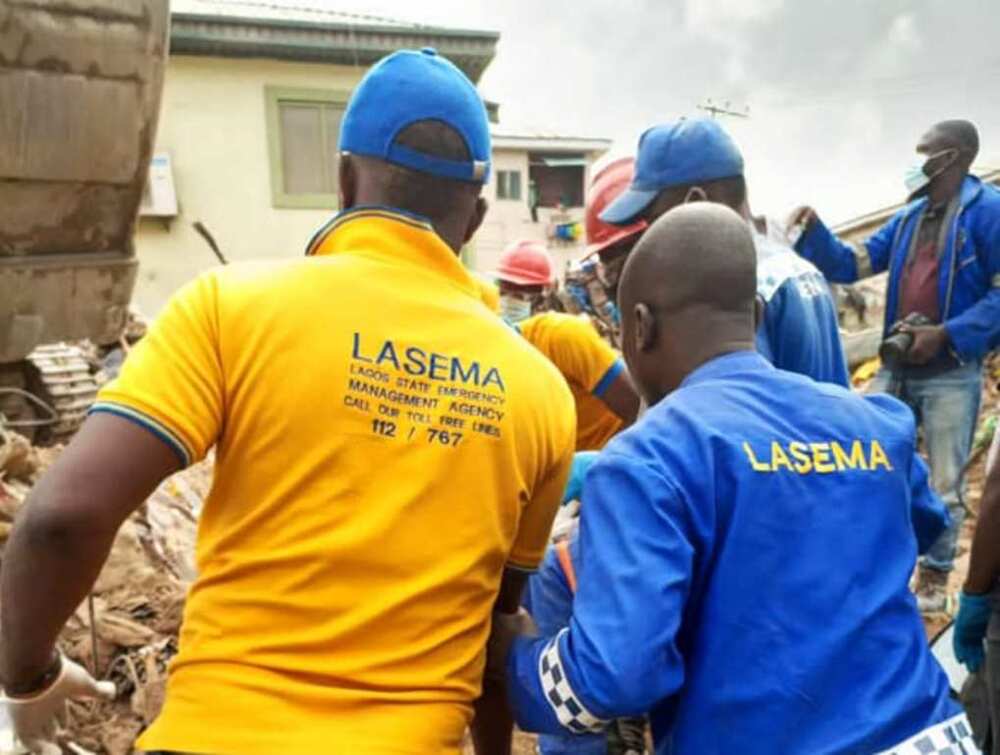 LASEMA officials, collapsed building