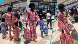 Designer Fashion GodD and little boy rock Ghana Must Go in different colours at the airport