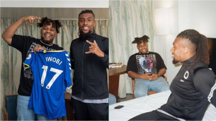 Super Eagles star Alex Iwobi gives Nigerian musician Buju a special gift as they both hangout