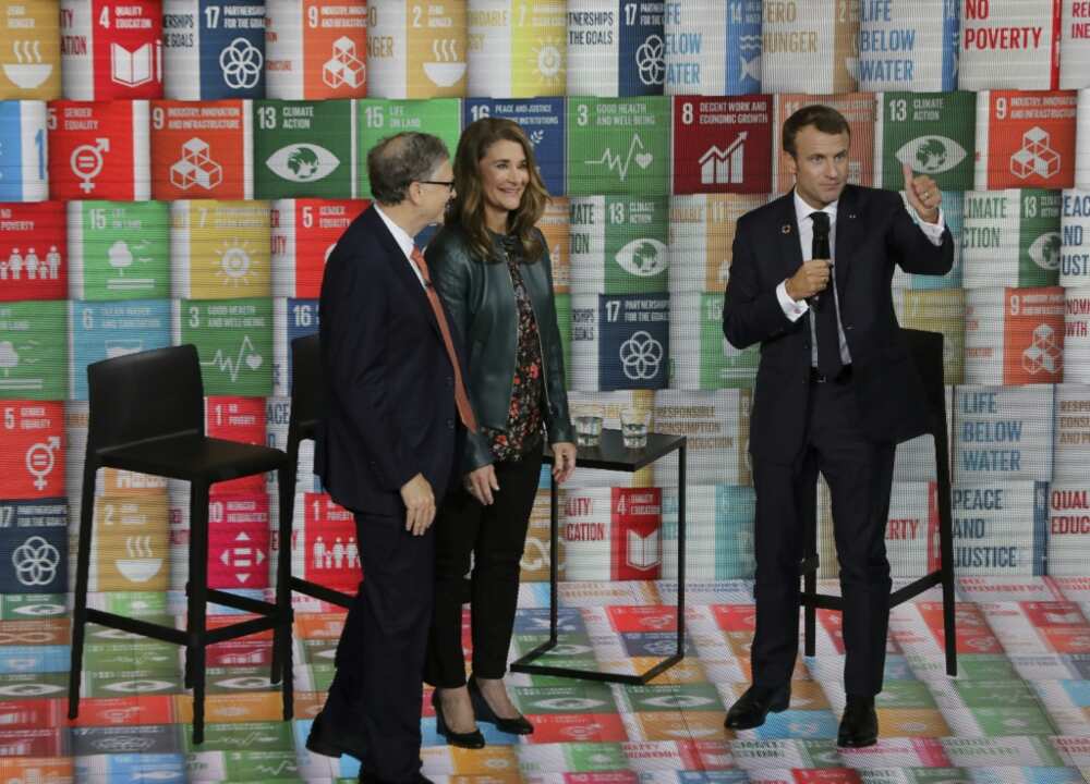 Melinda French Gates, pictured in 2018 with Bill Gates (left) and French President Emmanuel Macron, has pledged to use her fortune to help women and families