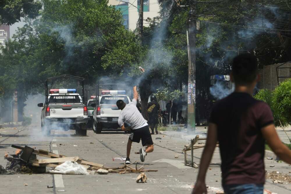 Protesters clash with riot police in the streets of Santa Cruz, Bolivia, on November 11,  2022