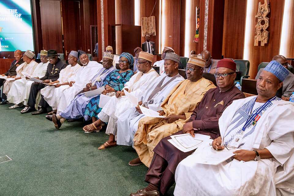 Buhari presides over swearing in ceremony of chairman, commissioners of FCSC