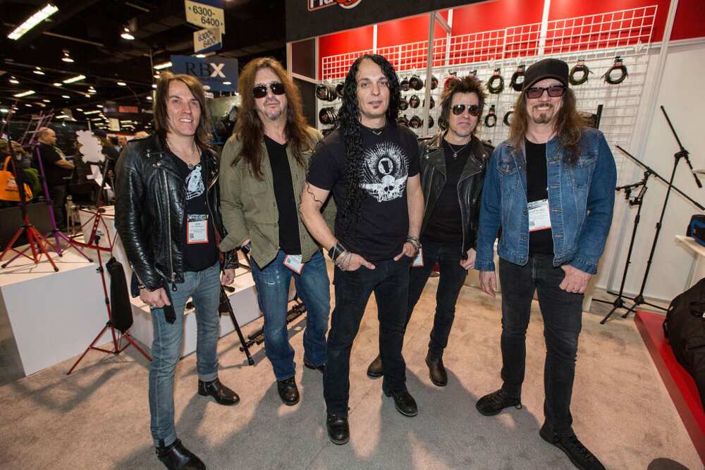 Skid Row members at the Pig Hog booth at The 2018 NAMM Show at Anaheim Convention Center