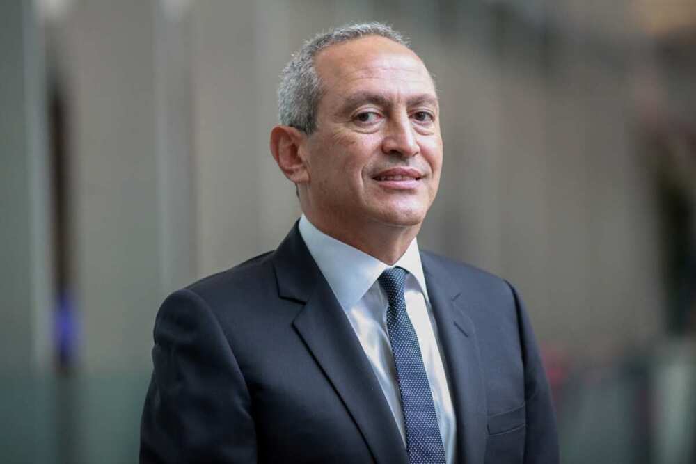 Nassef Sawiris poses for a photograph after an interview in New York