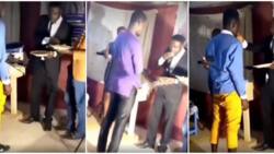 'Pastor' swallows eba, gives church members his finger to lick as communion in viral video, stirs reactions