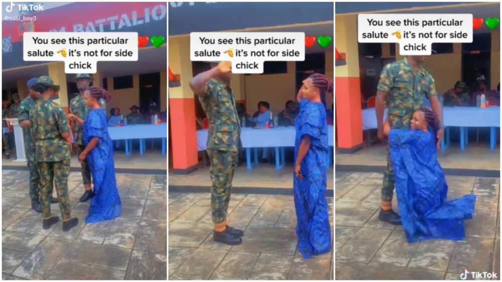 Soldier saluted his wife/woman knelt for husband.