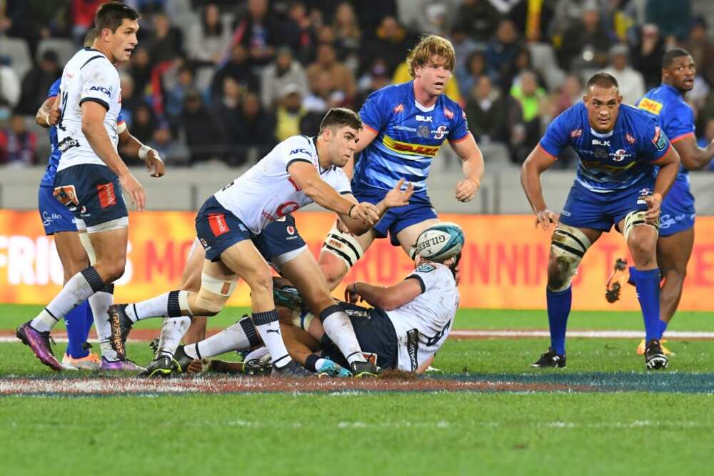 Bulls scrum-half Zak Burger (C) in action in the United Rugby Championship (URC) final rugby union match against the Stormers at Cape Town Stadium on June 18, 2022