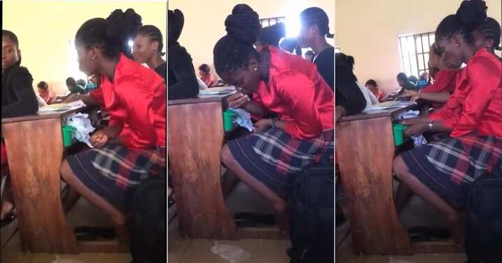 Female student consumes garri and soup in class