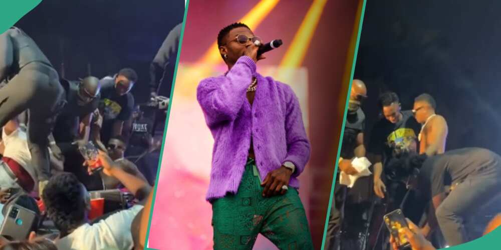 Clips of Wizkid getting mauled by fans at show