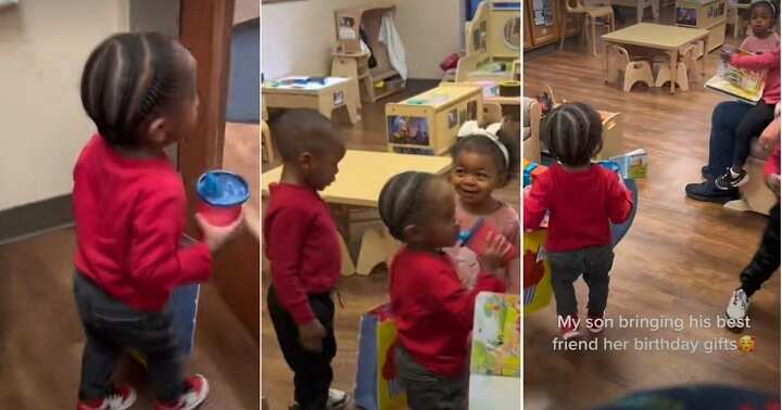 Little boy presents gift to classmate