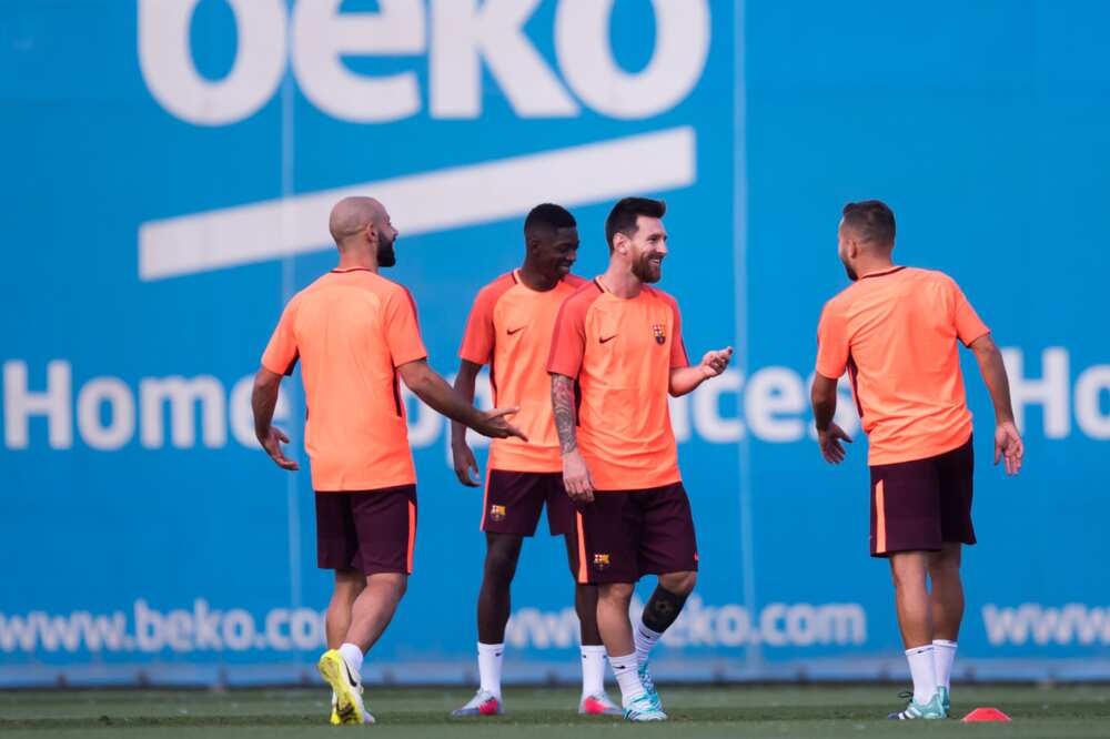 Lionel Messi and teammates