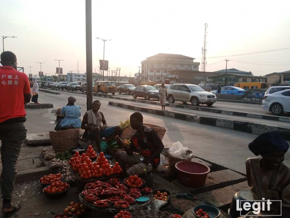 Mile 12 market, Lagos road, Lagos traders, CBN new cashless policy