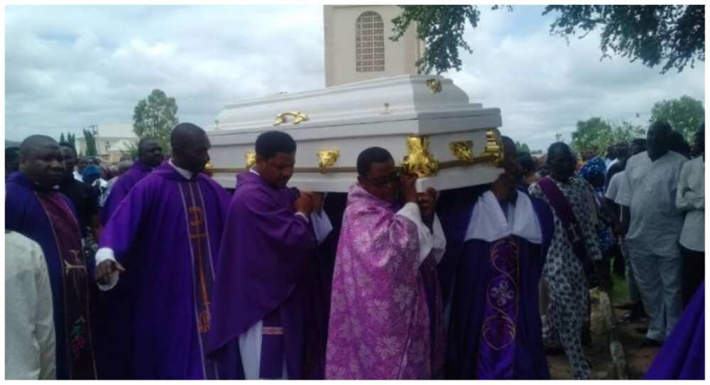 Tears as Catholic priest gruesomely killed, burnt by gunmen is buried