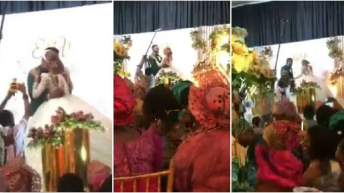 It's enough: Cute video emerges as Nigerian mum stops bride from kissing groom for too long at wedding party