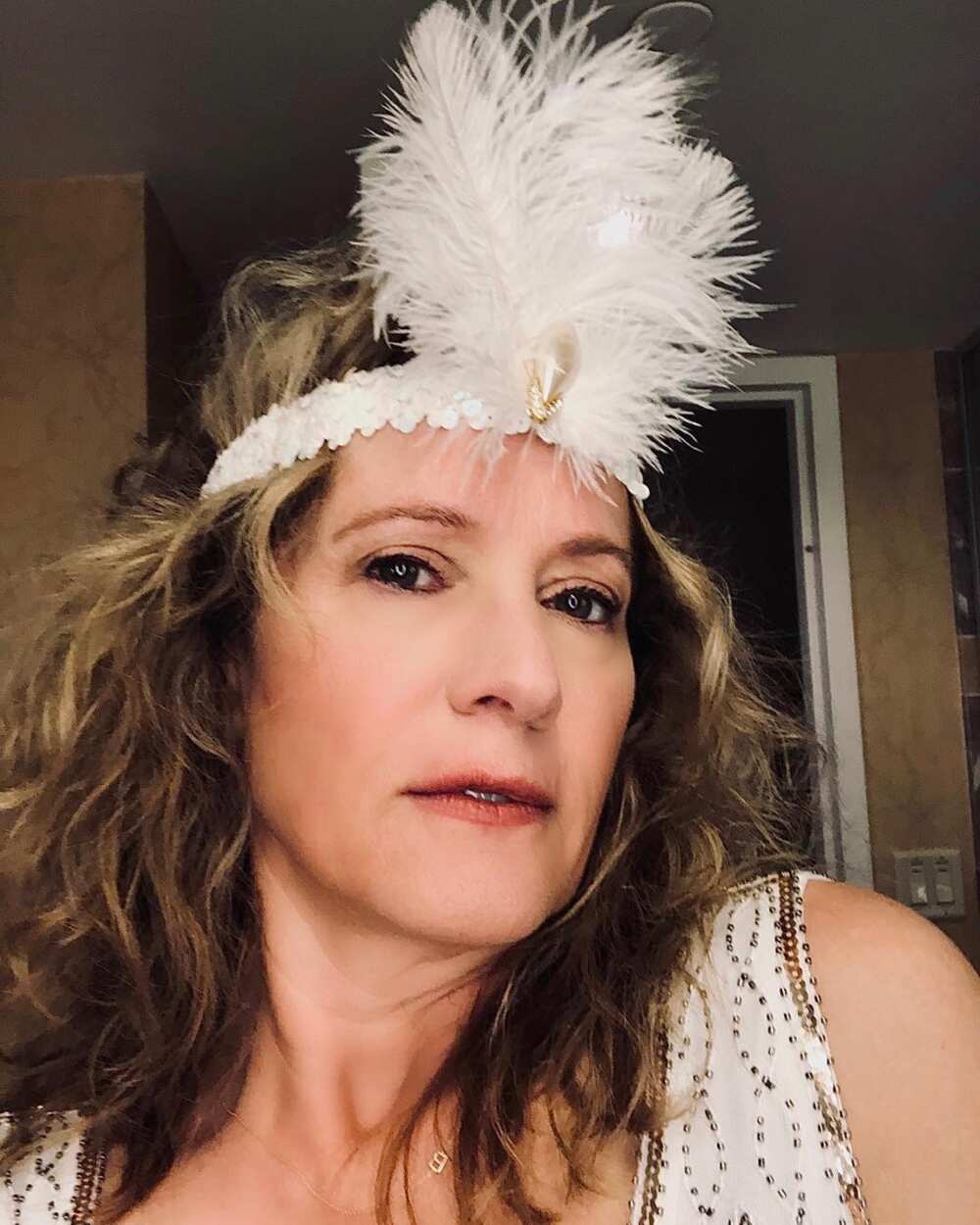 Nancy Travis bio: Age, height, measurements, husband, family - Legit.n