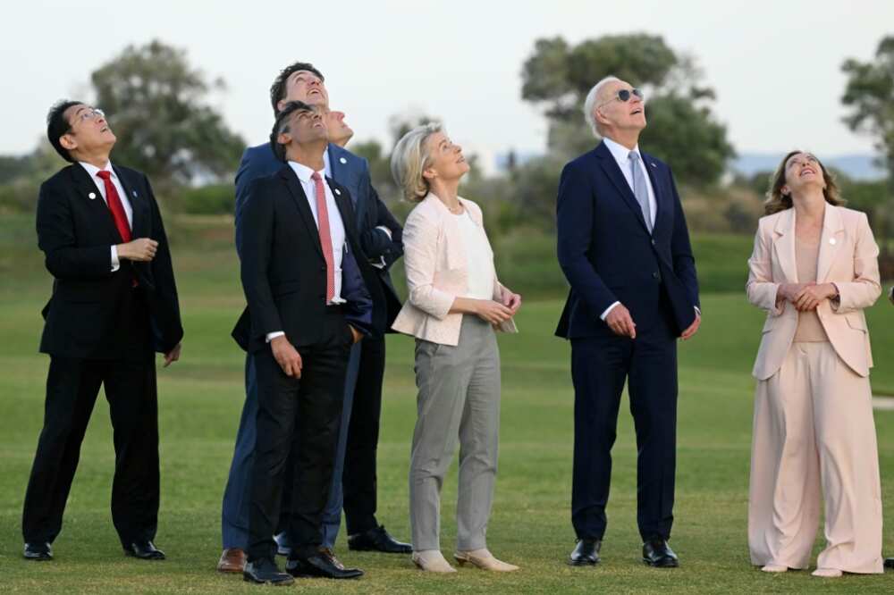 G7 leaders attend a skydiving demonstration at the San Domenico Golf Course in Savelletri, Italy