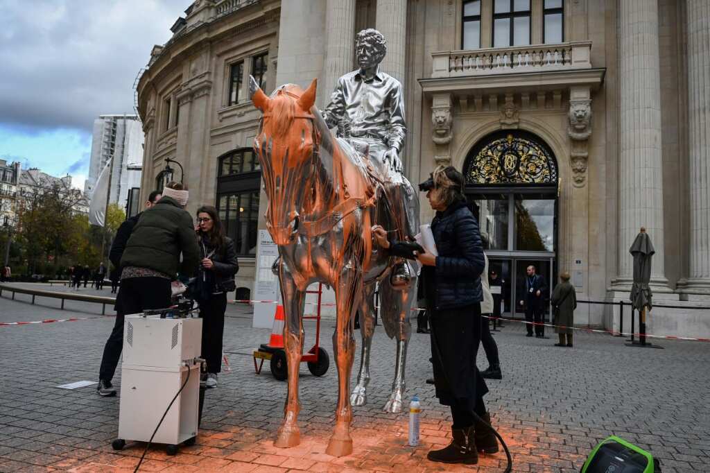 Climate activists pour paint on Charles Ray sculpture in Paris