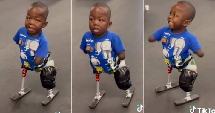 Little boy walks gently with prosthetics