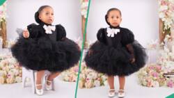 Little girl rocks cute black dress for 2nd birthday, shows emotions, netizens react: "It's tiring"