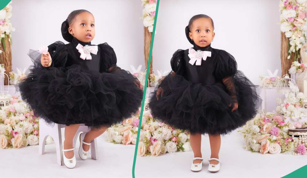 Little girl adorns cute black dress for her birthday