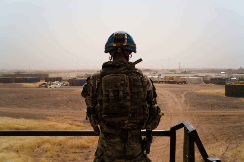 A British soldier stands watch in Menaka in 2021