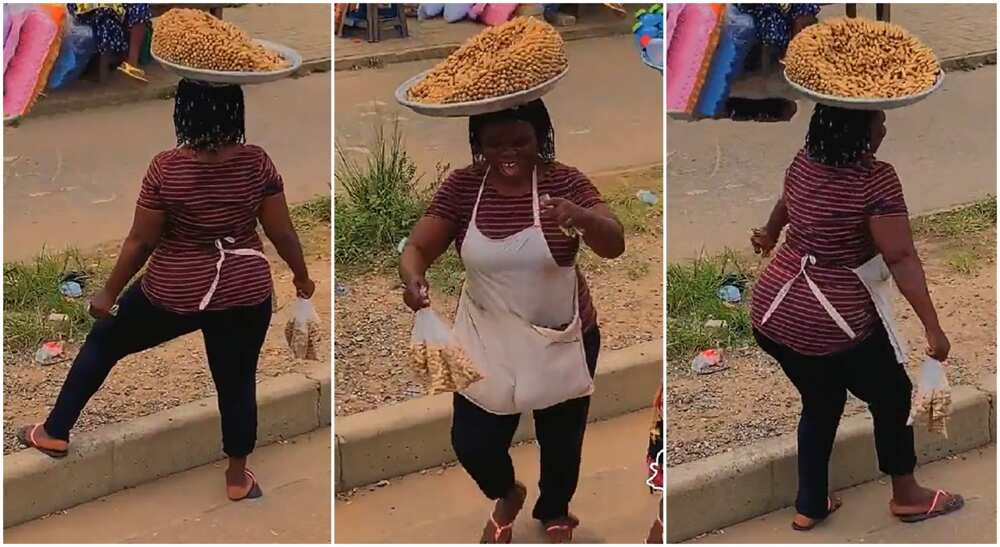 Photos of a lady dancing with a tray of groundnut on her head.