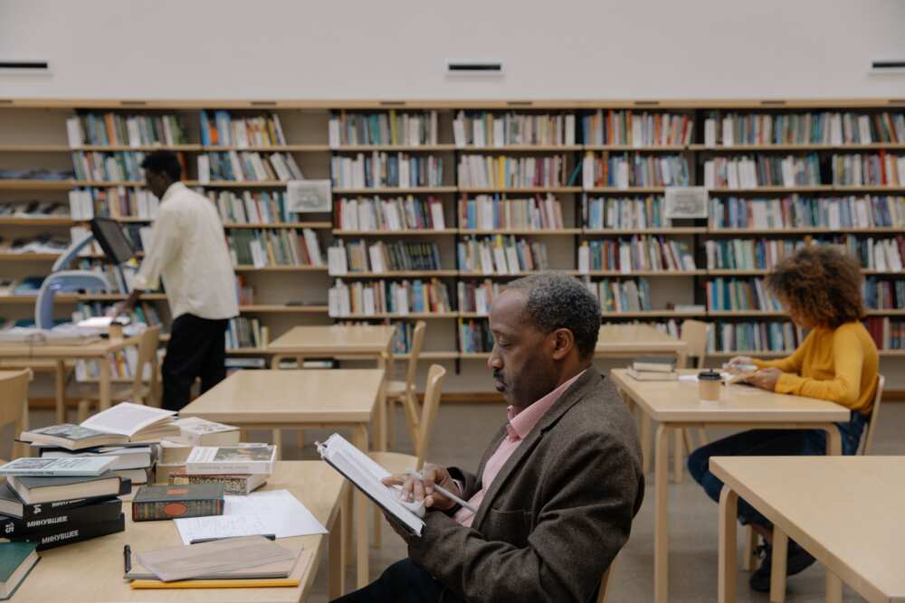 Students in the library studying.