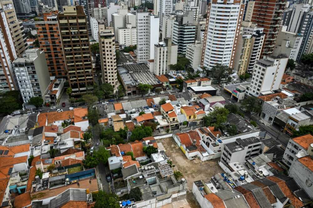 An aerial view of houses surrounded by high-rise buildings in the Pinheiros neighborhood of São Paulo, Brazil, is seen September 5, 2023