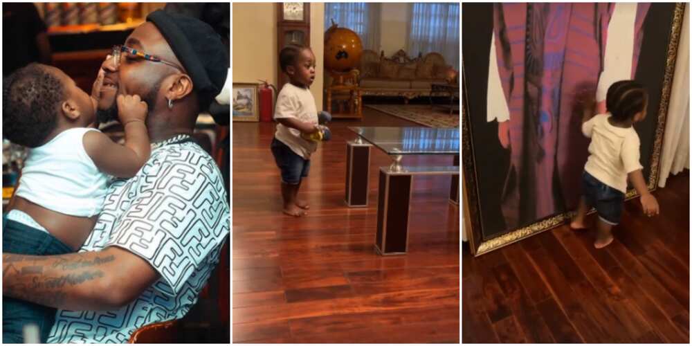 Heir Apparent: Davido Proudly Shows Off Ifeanyi as He Plays and Admires Photos in His Grandfather’s Mansion