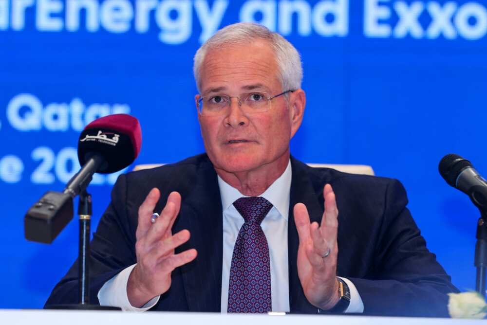 Exxon Mobil Corporation's Chairman and CEO Darren Woods speaks during a press conference and signing ceremony at QatarEnergy headquarters in Doha, on June 21, 2022