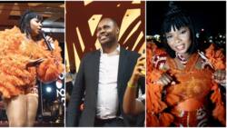 Yemi Alade sings for a man at a show, fans react to the look on his face in cute video: "He don fall in love"