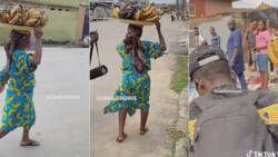 Elderly plantain hawker gathers crowd with sweet dance moves on the road, video causes frenzy
