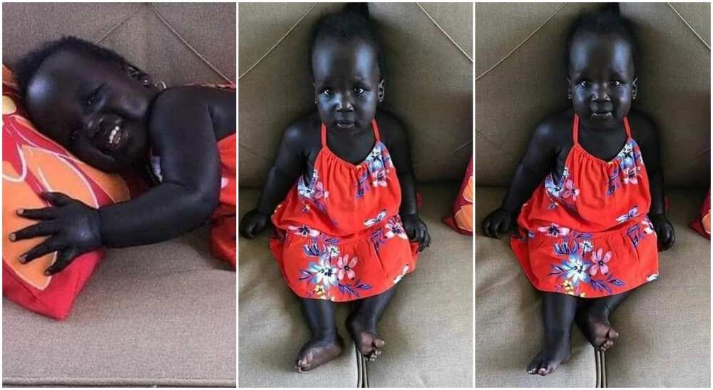 Little girl with shinning black skin.