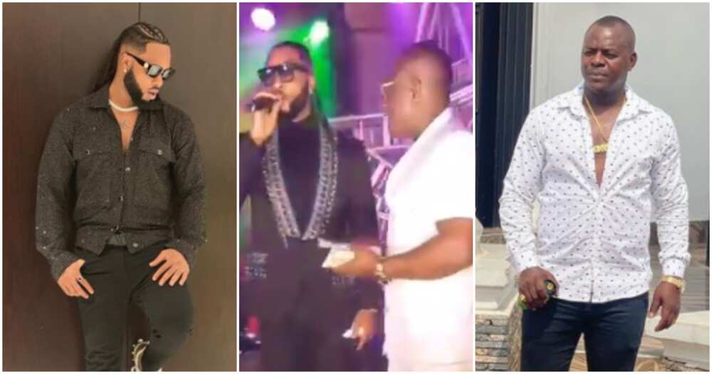 Flavour dodges rich colleague trying to spray money on his head Flavour dodges rich colleague trying to spray money on his head