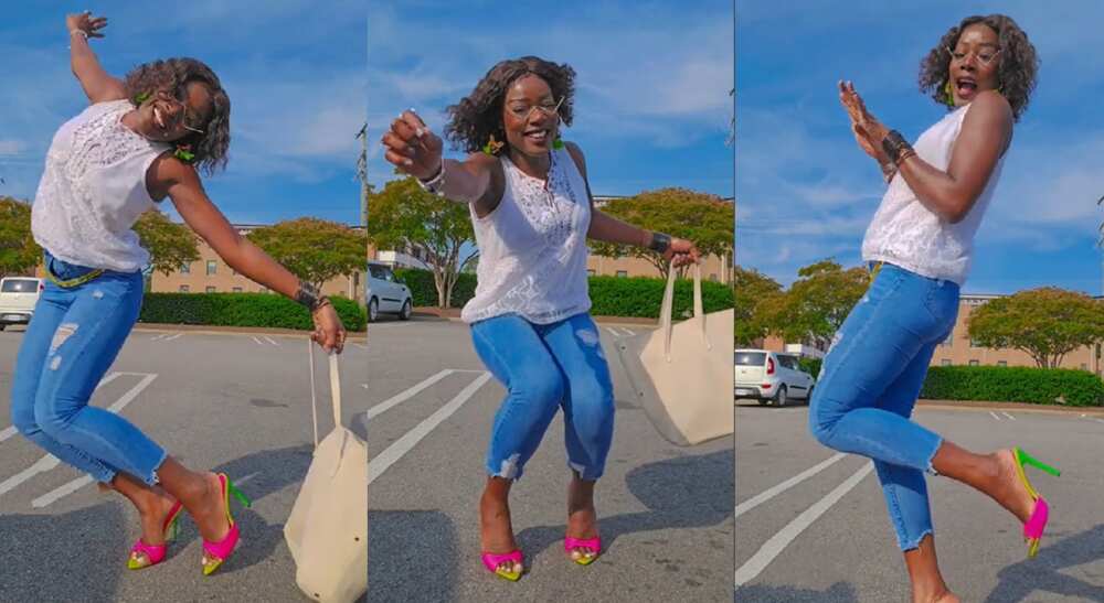 Photos of a beautiful lady dancing at a parking lot.