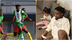Super Eagles star plays video game with his adorable daughter after Cameroon's double-header