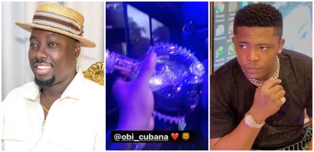 Photos of Obi Cubana and jeweller ObisGallery with a bottle of cognac.