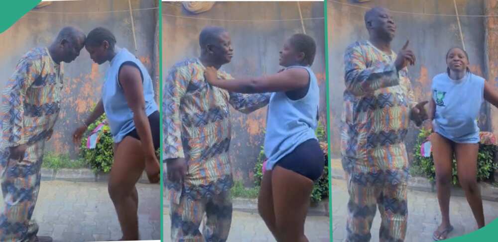 Nigerian lady dancing with her father.
