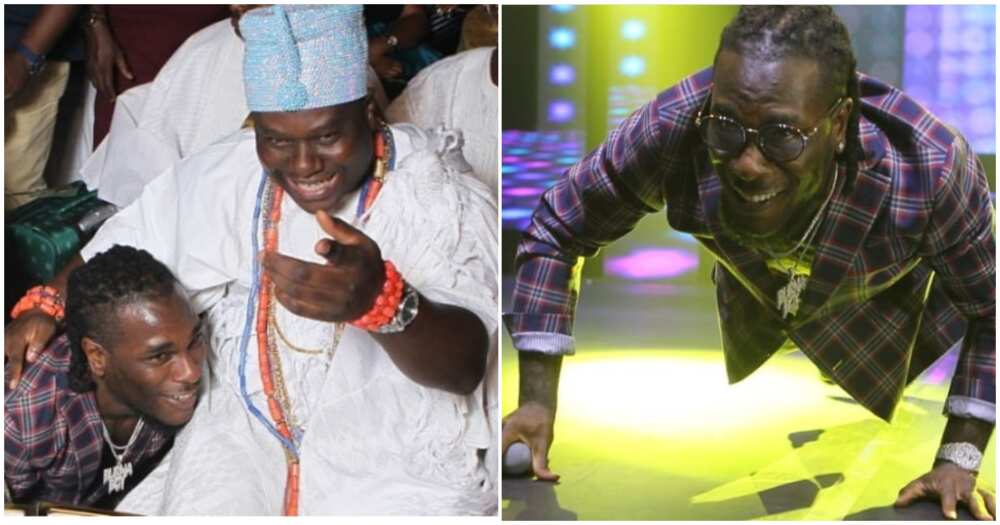 Burna Boy goes on his knees as he pays respect to Ooni of Ife (photo)