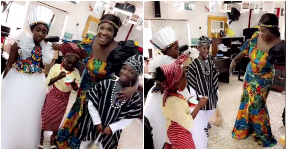 Mercy Johnson and kids in African outfits